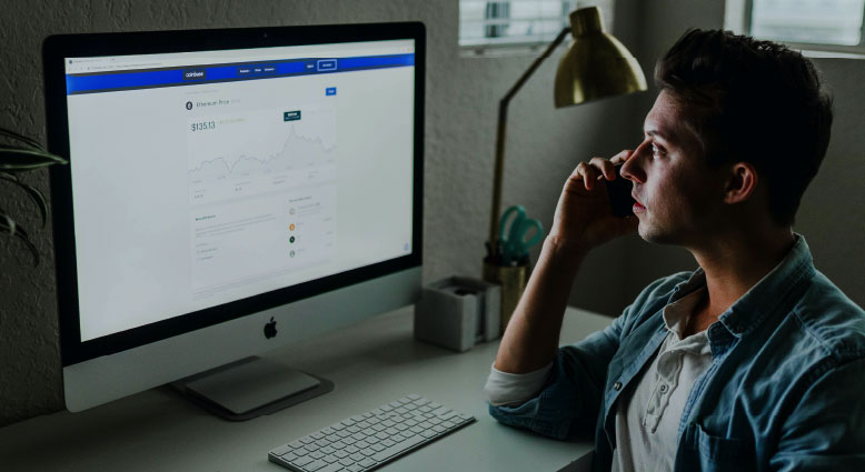 Man sitting in front of computer